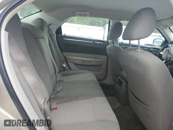 2009 Chrysler 300 LX z VIN 2C3KA43DX9H565543, wystawiony jako Copart lot #69347515 z przebiegiem 145 660 mil mil oraz Szkoda całkowita • Salvage title. Historia ofert i sprzedaży dostępna na DreamBid. Obrazek 10.