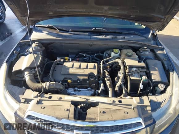 2014 Chevrolet Cruze 1LT z VIN 1G1PC5SB0E7306270, wystawiony jako IAAI lot #43335671 z przebiegiem 125 429 mil mil oraz . Historia ofert i sprzedaży dostępna na DreamBid. Obrazek 10.