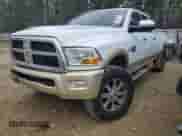 2012 Dodge RAM с VIN 3C6UD5LL4CG338615, выставлен на аукционе Copart как лот 45263175 с пробегом 232 166 миль миль и Списание • Salvage title. История ставок и продаж доступна на DreamBid. Изображение 1.