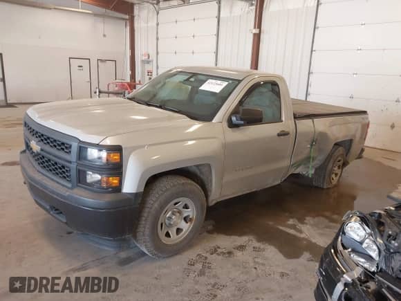 2014 Chevrolet Silverado 1500 Work Truck with VIN 1GCNKPEHXEZ233233, listed as a IAAI auction lot 42123681 with 97,797 mi miles and . Bid and sale history available at DreamBid. Image 2.
