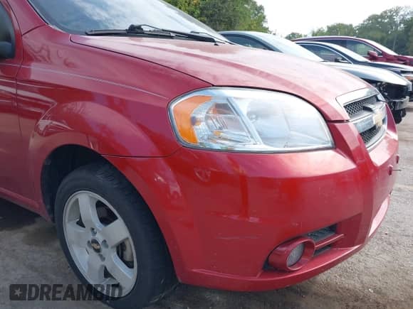 2011 Chevrolet Aveo 2LT z VIN KL1TG5DE2BB129643, wystawiony jako IAAI lot #43200174 z przebiegiem 140 982 mil mil oraz . Historia ofert i sprzedaży dostępna na DreamBid. Obrazek 12.