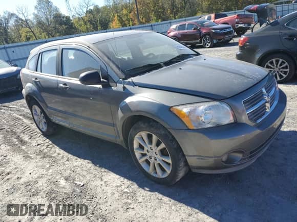 2011 Dodge Caliber Heat with VIN 1B3CB5HA7BD231380, listed as a Copart auction lot 82520765 with 217,144 mi miles and Clean title. Bid and sale history available at DreamBid. Image 4.
