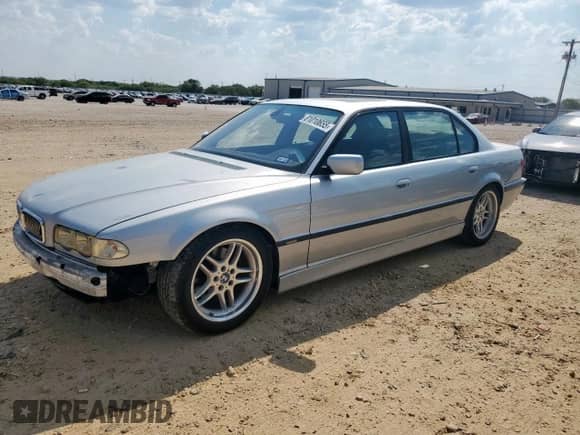 2001 BMW 7 Series 740iL with VIN WBAGH83491DP22465, listed as a Copart auction lot 81010655 with 153,731 mi miles and Salvage title. Bid and sale history available at DreamBid. Image 1.
