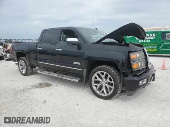 2014 Chevrolet Silverado 1500 High Country with VIN 3GCUKTEJ5EG319671, listed as a Copart auction lot 50453775 with Not provided miles and Salvage title. Bid and sale history available at DreamBid. Image 4.