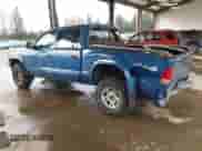 2003 Dodge Dakota Sport with VIN 1D7HG38N63S190756, listed as a IAAI auction lot 41862534 with 177,767 mi miles and . Bid and sale history available at DreamBid. Image 3.