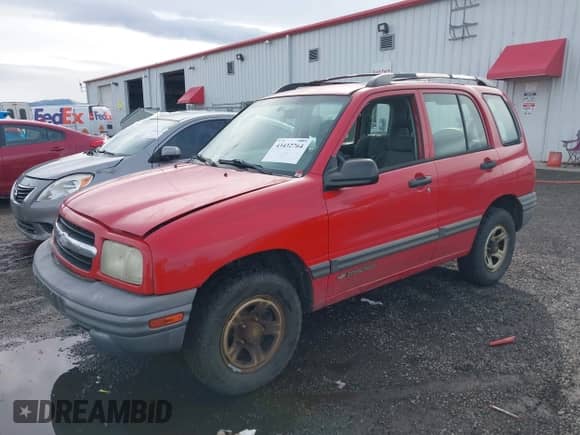 2002 Chevrolet Tracker with VIN 2CNBJ13C726908601, listed as a IAAI auction lot 43432764 with 117,301 mi miles and . Bid and sale history available at DreamBid. Image 2.