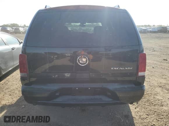 2004 Cadillac Escalade с VIN 1GYEK63N14R104406, выставлен на аукционе Copart как лот 80322345 с пробегом 13 784 миль миль и Списание • Salvage title. История ставок и продаж доступна на DreamBid. Изображение 6.