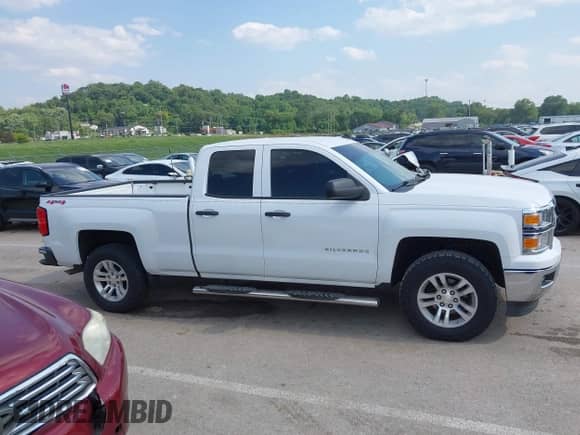 2014 Chevrolet Silverado 1500 LT with VIN 1GCVKREC5EZ412652, listed as a IAAI auction lot 42420856 with 165,891 mi miles and . Bid and sale history available at DreamBid. Image 13.