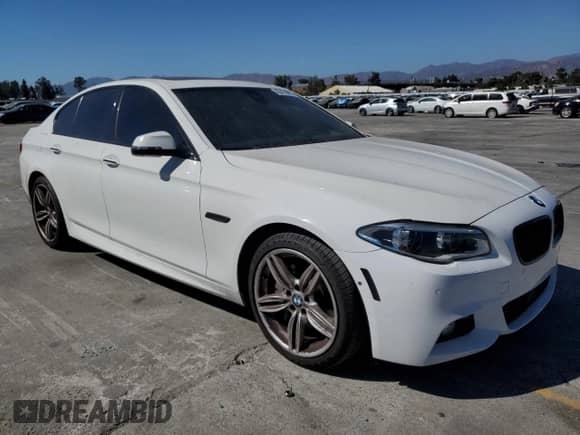2016 BMW 5 Series 550i xDrive with VIN WBAKP9C50GD981138, listed as a Copart auction lot 66470895 with 105,258 mi miles and Salvage title. Bid and sale history available at DreamBid. Image 4.