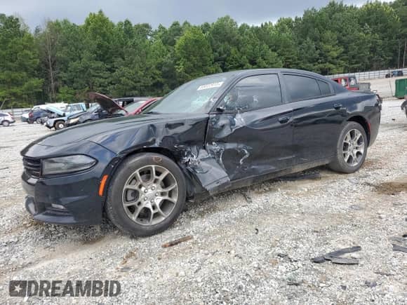 2015 Dodge Charger SXT with VIN 2C3CDXJG1FH762879, listed as a Copart auction lot 65022915 with 117,269 mi miles and Salvage title. Bid and sale history available at DreamBid. Image 1.