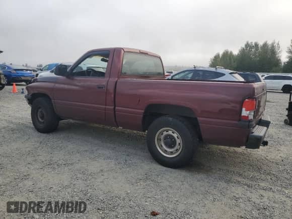 2001 Dodge 1500 Work Special with VIN 1B7HC16X31S724808, listed as a Copart auction lot 71476495 with 147,982 mi miles and Salvage title. Bid and sale history available at DreamBid. Image 2.