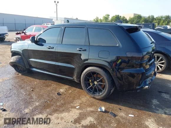 2021 Jeep Grand Cherokee Trackhawk z VIN 1C4RJFN94MC786470, wystawiony jako IAAI lot #42877128 z przebiegiem 47 250 mil mil oraz . Historia ofert i sprzedaży dostępna na DreamBid. Obrazek 3.