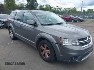 2012 Dodge Journey SXT z VIN 3C4PDDBG1CT213809, wystawiony jako IAAI lot #43049048 z przebiegiem 178 647 mil mil oraz . Historia ofert i sprzedaży dostępna na DreamBid. Obrazek 1.