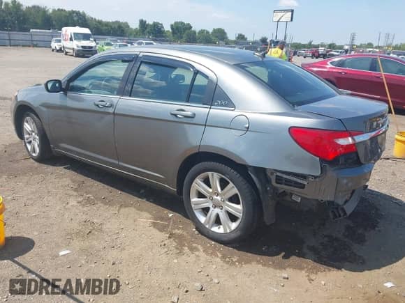 2013 Chrysler 200 Touring with VIN 1C3CCBBB1DN539965, listed as a IAAI auction lot 42901519 with 160,606 mi miles and . Bid and sale history available at DreamBid. Image 3.