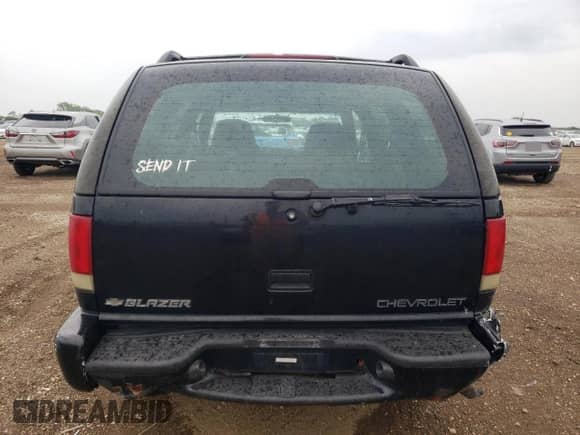 2000 Chevrolet Blazer LS z VIN 1GNDT13W1Y2112487, wystawiony jako Copart lot #63741485 z przebiegiem 270 945 mil mil oraz Szkoda całkowita • Salvage title. Historia ofert i sprzedaży dostępna na DreamBid. Obrazek 6.