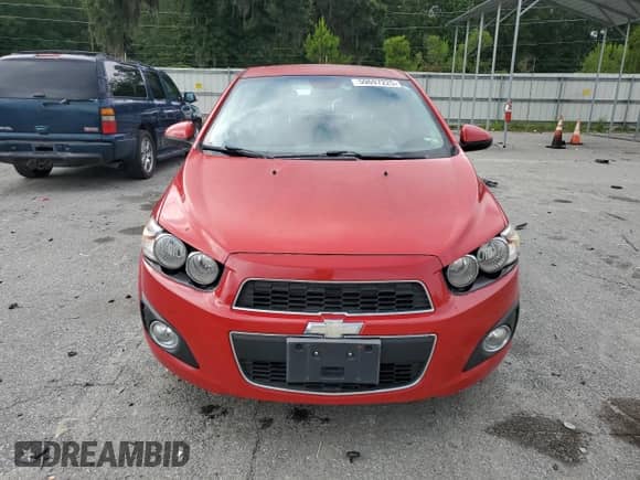 2012 Chevrolet Sonic LTZ с VIN 1G1JE6SH7C4162547, выставлен на аукционе Copart как лот 59697225 с пробегом 112 332 миль миль и Чистый • Clean title. История ставок и продаж доступна на DreamBid. Изображение 5.
