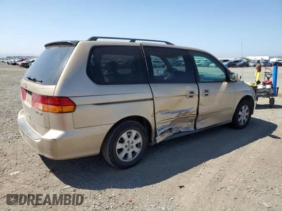 2002 Honda Odyssey EX z VIN 2HKRL18682H549304, wystawiony jako Copart lot #71229805 z przebiegiem 192 150 mil mil oraz Szkoda całkowita • Salvage title. Historia ofert i sprzedaży dostępna na DreamBid. Obrazek 3.
