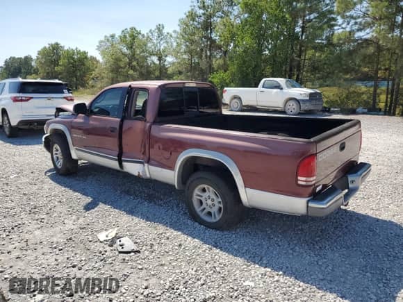 2001 Dodge Dakota Sport с VIN 1B7GL22N11S237838, выставлен на аукционе Copart как лот 75295524 с пробегом Не указан миль и Списание • Salvage title. История ставок и продаж доступна на DreamBid. Изображение 2.