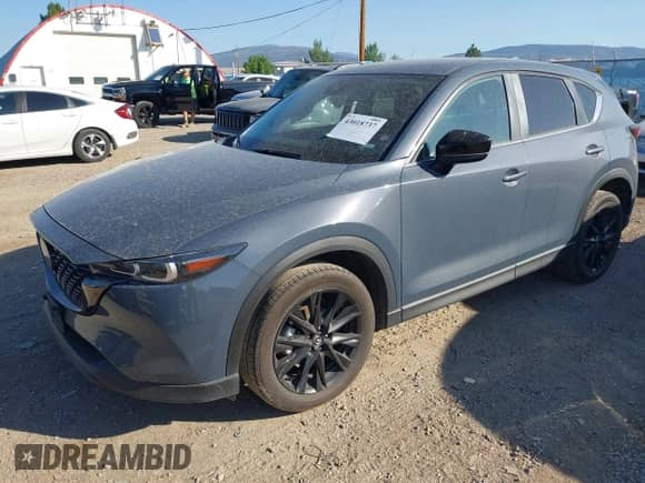 2025 Mazda CX-5 S Carbon Edition z VIN JM3KFBCM8S0587267, wystawiony jako IAAI lot #43018737 z przebiegiem 19 192 mil mil oraz . Historia ofert i sprzedaży dostępna na DreamBid. Obrazek 18.