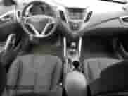 2012 Hyundai Veloster w/Red Int z VIN KMHTC6AD1CU037818, wystawiony jako Copart lot #69647765 z przebiegiem 305 408 mil mil oraz Szkoda całkowita • Salvage title. Historia ofert i sprzedaży dostępna na DreamBid. Obrazek 8.