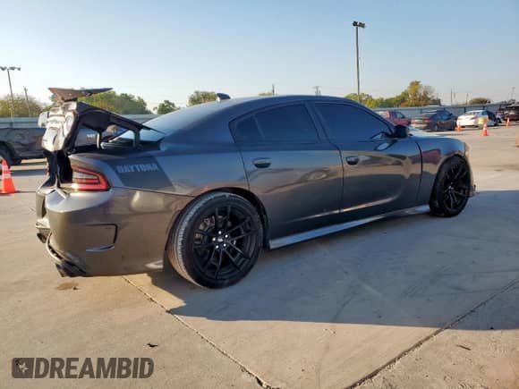 2021 Dodge Charger Scat Pack Widebody z VIN 2C3CDXGJ7MH540721, wystawiony jako Copart lot #84951435 z przebiegiem 78 107 mil mil oraz Szkoda całkowita • Salvage title. Historia ofert i sprzedaży dostępna na DreamBid. Obrazek 3.