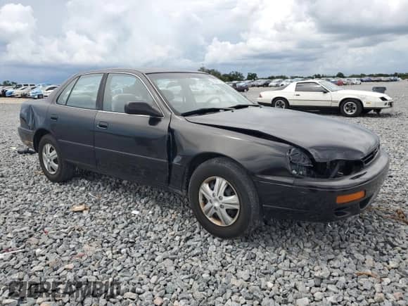 1996 Toyota Camry DX z VIN 4T1BG12K7TU811280, wystawiony jako Copart lot #72037795 z przebiegiem 110 064 mil mil oraz Szkoda całkowita • Salvage title. Historia ofert i sprzedaży dostępna na DreamBid. Obrazek 4.
