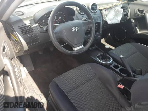 2005 Hyundai Tiburon GS с VIN KMHHM65D45U175370, выставлен на аукционе Copart как лот 64657525 с пробегом 215 287 миль миль и Списание • Salvage title. История ставок и продаж доступна на DreamBid. Изображение 8.