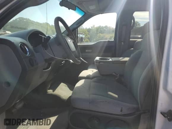 2007 Ford F-150 XLT with VIN 1FTPW12V47FB47571, listed as a Copart auction lot 80825875 with 227,903 mi miles and Salvage title. Bid and sale history available at DreamBid. Image 7.