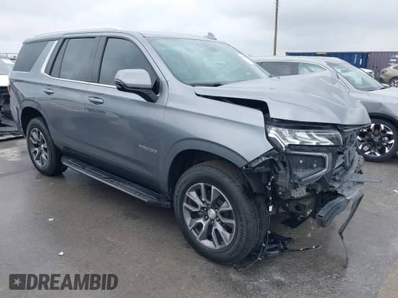 2022 Chevrolet Tahoe LT z VIN 1GNSCNKD8NR282251, wystawiony jako IAAI lot #42129473 z przebiegiem 48 477 mil mil oraz . Historia ofert i sprzedaży dostępna na DreamBid. Obrazek 1.