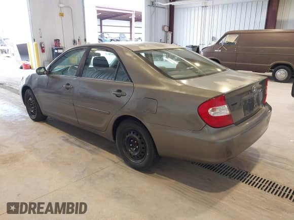 2004 Toyota Camry LE with VIN 4T1BE32K64U904956, listed as a IAAI auction lot 42352834 with 226,609 mi miles and . Bid and sale history available at DreamBid. Image 3.