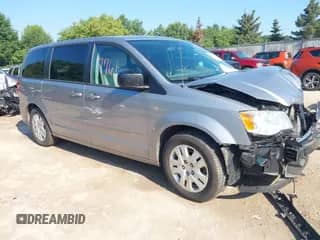 2014 Dodge Grand Caravan SE z VIN 2C4RDGBG6ER362491, wystawiony jako IAAI lot #42977761 z przebiegiem 240 771 mil mil oraz . Historia ofert i sprzedaży dostępna na DreamBid. Obrazek 1.