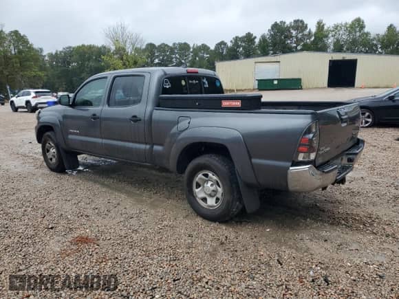 2014 Toyota Tacoma PreRunner with VIN 3TMKU4HN1EM038779, listed as a Copart auction lot 81866785 with 215,853 mi miles and Salvage title. Bid and sale history available at DreamBid. Image 2.