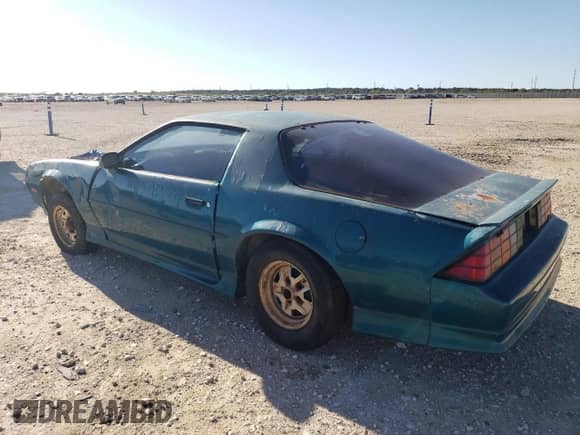 1991 Chevrolet Camaro с VIN 1G1FP23TXML198798, выставлен на аукционе Copart как лот 79668634 с пробегом 102 914 миль миль и Чистый • Clean title. История ставок и продаж доступна на DreamBid. Изображение 2.