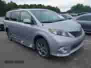 2014 Toyota Sienna SE with VIN 5TDXK3DC6ES421515, listed as a IAAI auction lot 43102179 with 63,756 mi miles and . Bid and sale history available at DreamBid. Image 1.