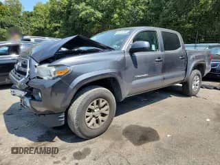 2017 Toyota Tacoma SR5 with VIN 5TFAZ5CN8HX036133, listed as a Copart auction lot 80144295 with 297,702 mi miles and Clean title. Bid and sale history available at DreamBid. Image 1.