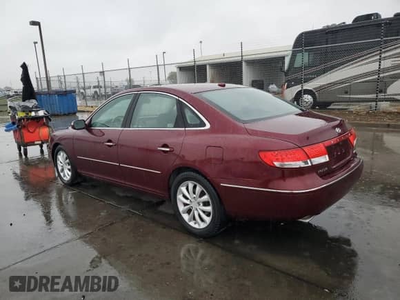 2008 Hyundai Azera Limited with VIN KMHFC46F18A318621, listed as a Copart auction lot 81954985 with 115,736 mi miles and Salvage title. Bid and sale history available at DreamBid. Image 2.