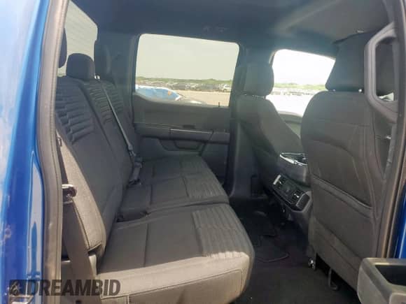 2022 Ford F-150 XL z VIN 1FTEW1C57NKF22668, wystawiony jako Copart lot #53080935 z przebiegiem 11 484 mil mil oraz Czysty tytuł • Clean title. Historia ofert i sprzedaży dostępna na DreamBid. Obrazek 10.