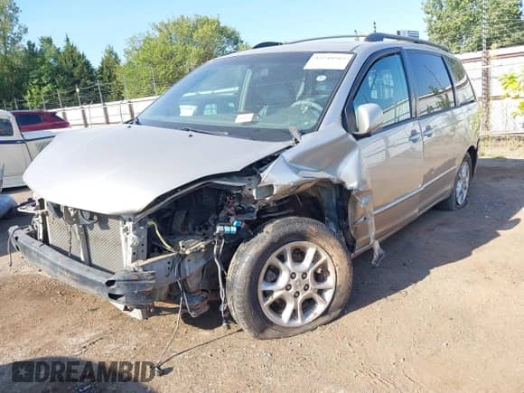 2005 Toyota Sienna XLE Limited with VIN 5TDZA22C75S289728, listed as a IAAI auction lot 43248565 with Not provided miles and . Bid and sale history available at DreamBid. Image 2.