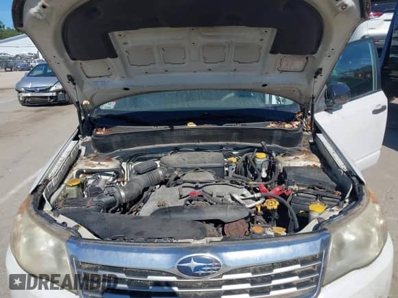 2010 Subaru Forester X с VIN JF2SH6AC5AG748055, выставлен на аукционе IAAI как лот 43253600 с пробегом 164 588 миль миль и . История ставок и продаж доступна на DreamBid. Изображение 10.