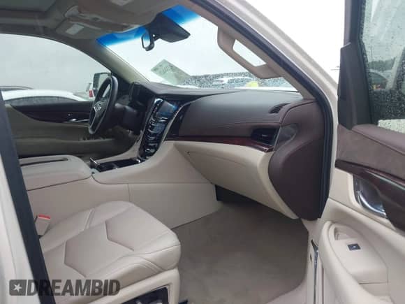 2015 Cadillac Escalade ESV Premium with VIN 1GYS4TKJ6FR708255, listed as a IAAI auction lot 42244621 with 31,407 mi miles and . Bid and sale history available at DreamBid. Image 5.