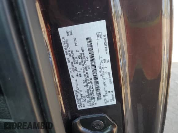 2018 Ford F-150 XL with VIN 1FTFX1E5XJKG09702, listed as a Copart auction lot 84954545 with 115,537 mi miles and Clean title. Bid and sale history available at DreamBid. Image 12.