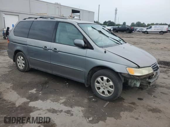 2002 Honda Odyssey EX с VIN 5FNRL186X2B025473, выставлен на аукционе Copart как лот 84551975 с пробегом 180 720 миль миль и Списание • Salvage title. История ставок и продаж доступна на DreamBid. Изображение 4.