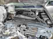 2004 Chevrolet Blazer LS z VIN 1GNDT13X84K120850, wystawiony jako Copart lot #72561234 z przebiegiem 188 094 mil mil oraz Szkoda całkowita • Salvage title. Historia ofert i sprzedaży dostępna na DreamBid. Obrazek 11.