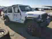 2024 Jeep Wrangler Willys with VIN 1C4RJXDGXRW263627, listed as a Copart auction lot 44067935 with 820 mi miles and Salvage title. Bid and sale history available at DreamBid. Image 4.