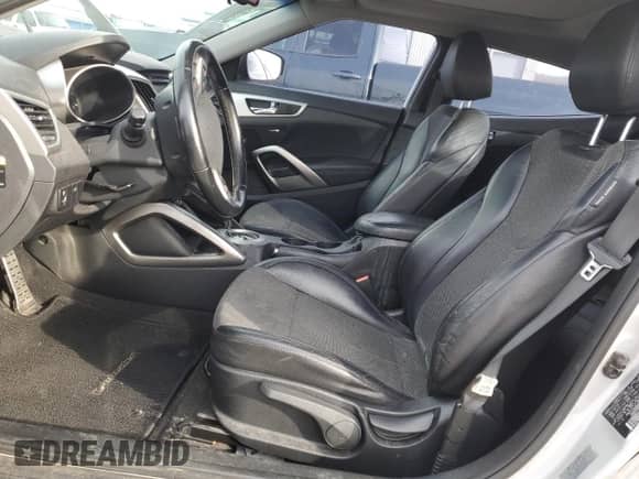 2014 Hyundai Veloster с VIN KMHTC6AD5EU207343, выставлен на аукционе Copart как лот 48344685 с пробегом Не указан миль и На запчасти • Non repairable. История ставок и продаж доступна на DreamBid. Изображение 7.