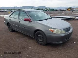 2003 Toyota Camry LE with VIN 4T1BE32K03U720501, listed as a IAAI auction lot 43427722 with 286,385 mi miles and . Bid and sale history available at DreamBid. Image 1.