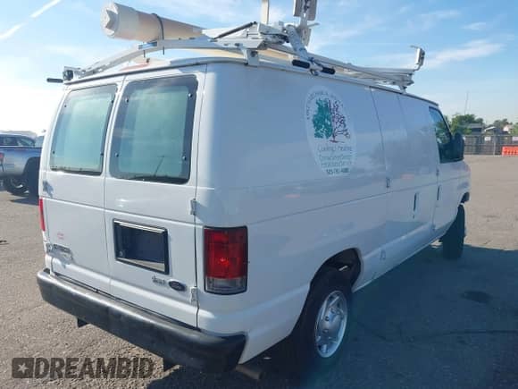 2012 Ford Econoline Cargo Commercial with VIN 1FTNE1EW3CDB06188, listed as a IAAI auction lot 40328803 with 138,502 mi miles and . Bid and sale history available at DreamBid. Image 4.