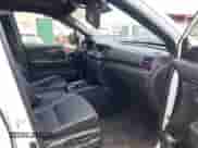 2021 Honda Passport EX-L with VIN 5FNYF7H59MB001083, listed as a IAAI auction lot 42943781 with 56,549 mi miles and . Bid and sale history available at DreamBid. Image 5.