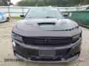 2016 Dodge Charger SE z VIN 2C3CDXBG0GH121285, wystawiony jako Copart lot #86305225 z przebiegiem 153 932 mil mil oraz Czysty tytuł • Clean title. Historia ofert i sprzedaży dostępna na DreamBid. Obrazek 5.