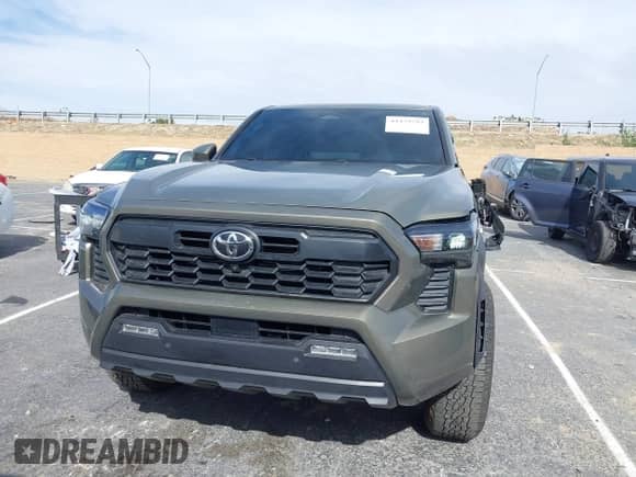 2024 Toyota Tacoma SR5 with VIN 3TMLB5JN6RM027745, listed as a IAAI auction lot 41479793 with 16,376 mi miles and . Bid and sale history available at DreamBid. Image 12.